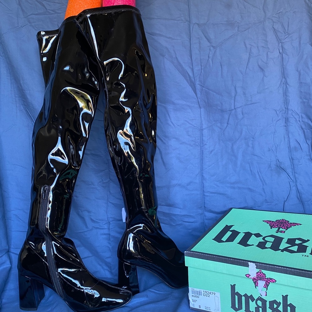 New in box black knee high boots. Size: 8